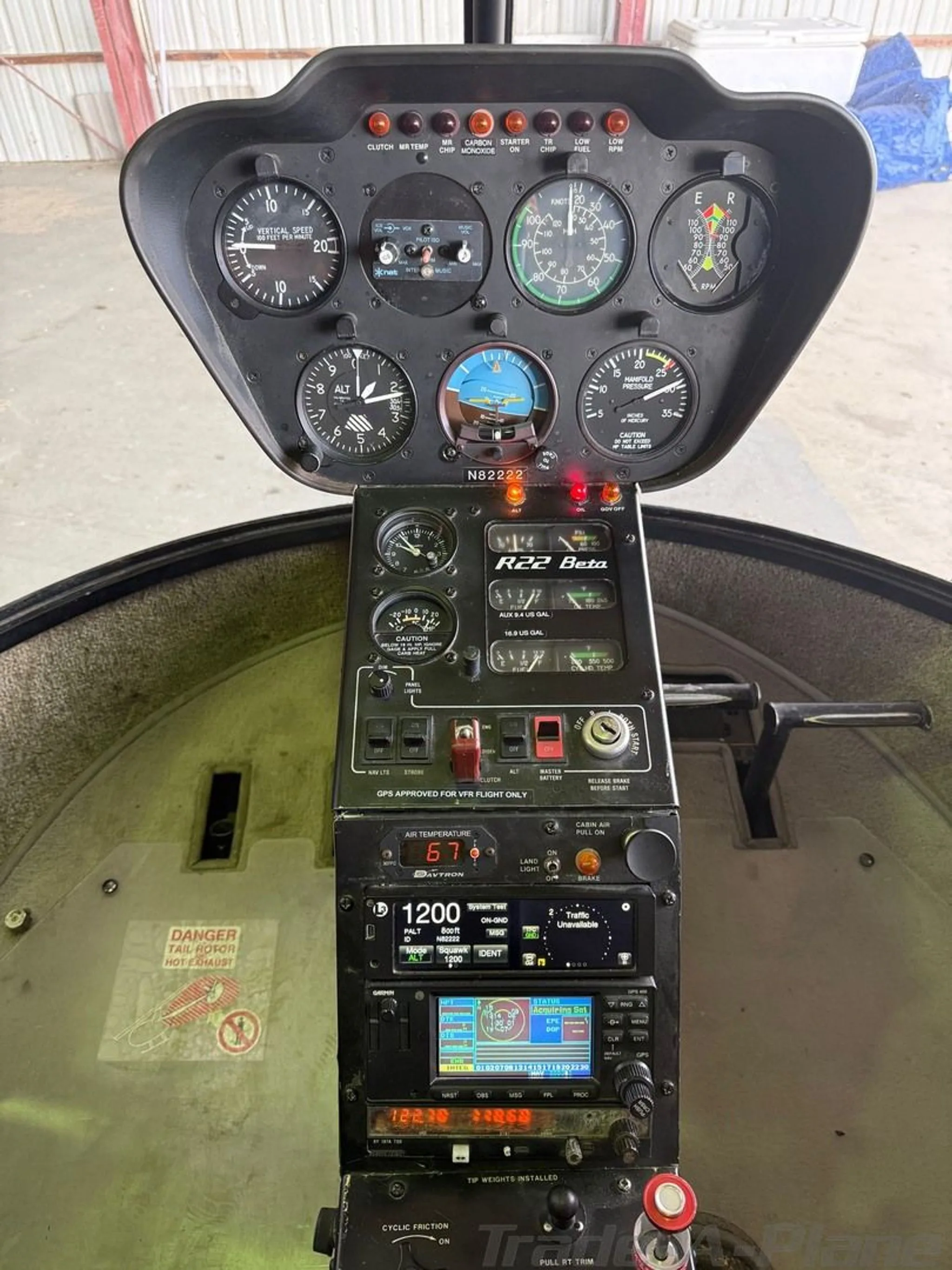 The instrument panel and avionics stack of the Robinson R22 Beta helicopter, N82222.