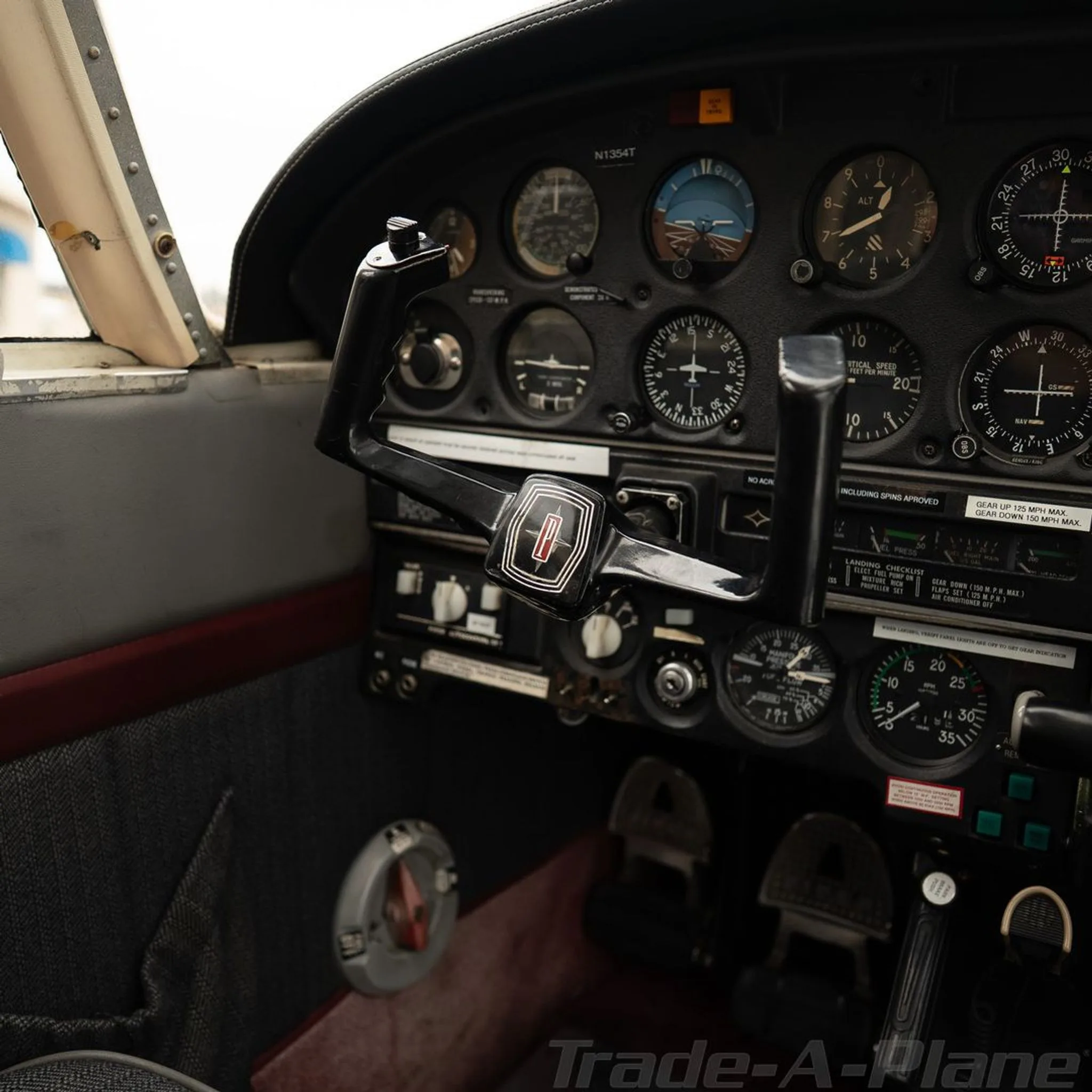 Close-up of the pilot's yoke and a section of the instrument panel.