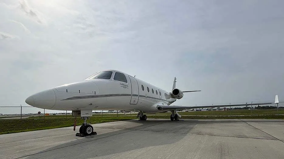 A Gulfstream G150 parked on the tarmac.