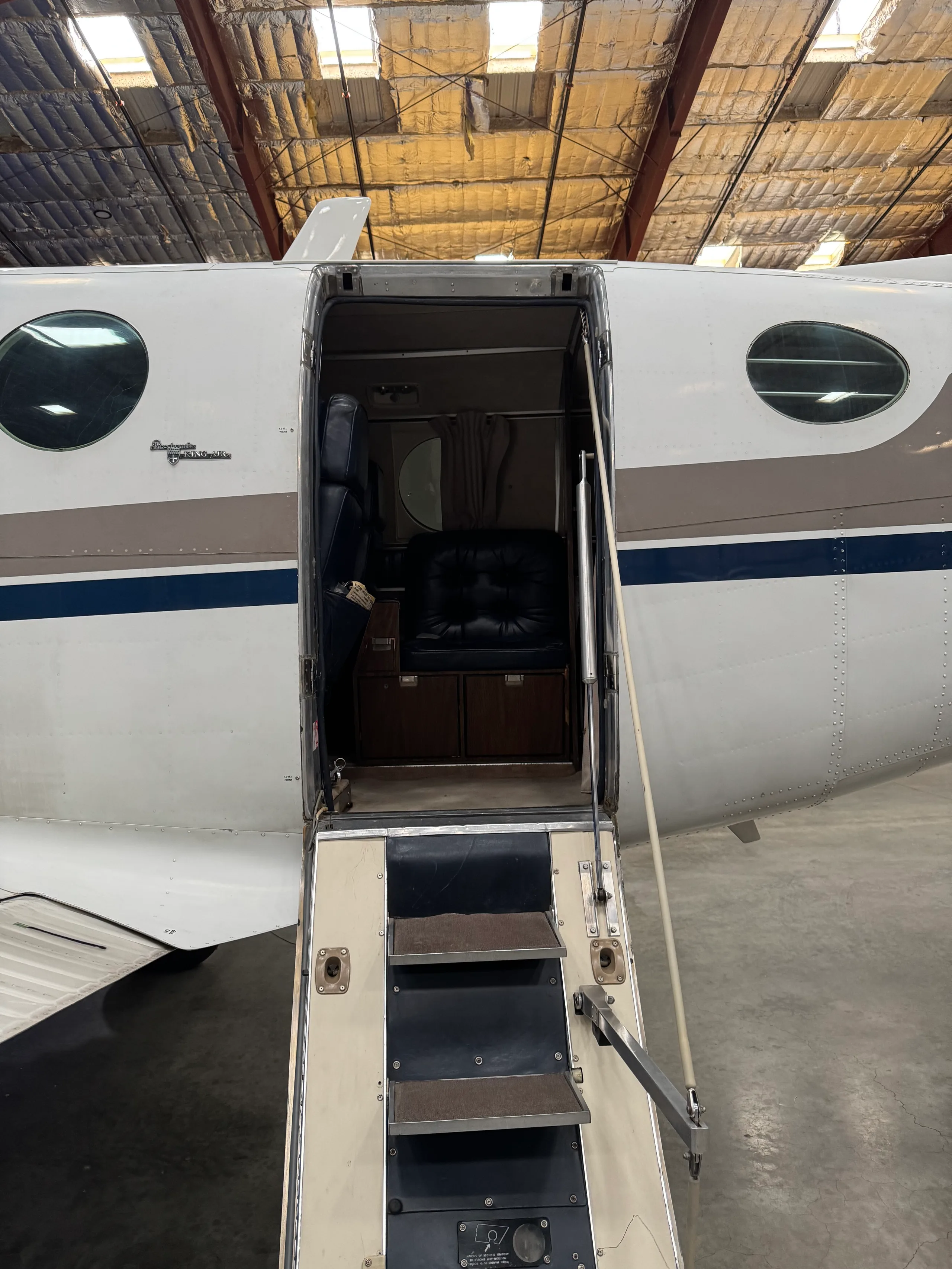 Close-up of the aircraft's entry door and steps.