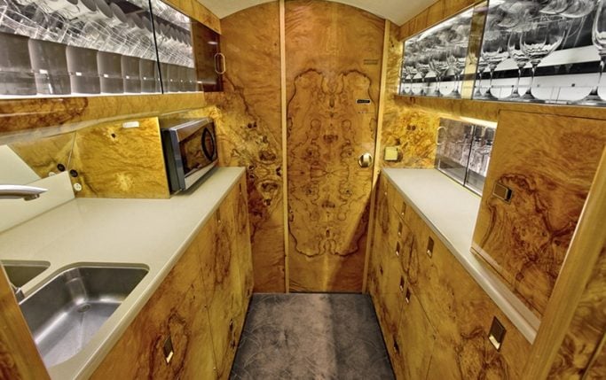 Aircraft cabin with leather seats.