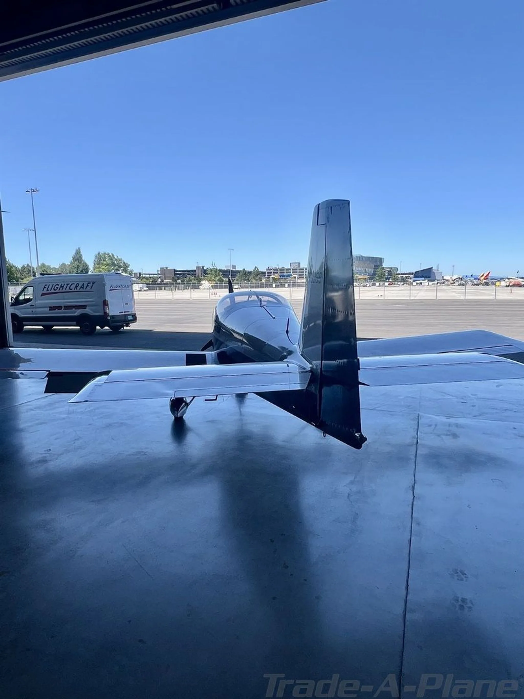 The rear view of the aircraft from inside the hangar.