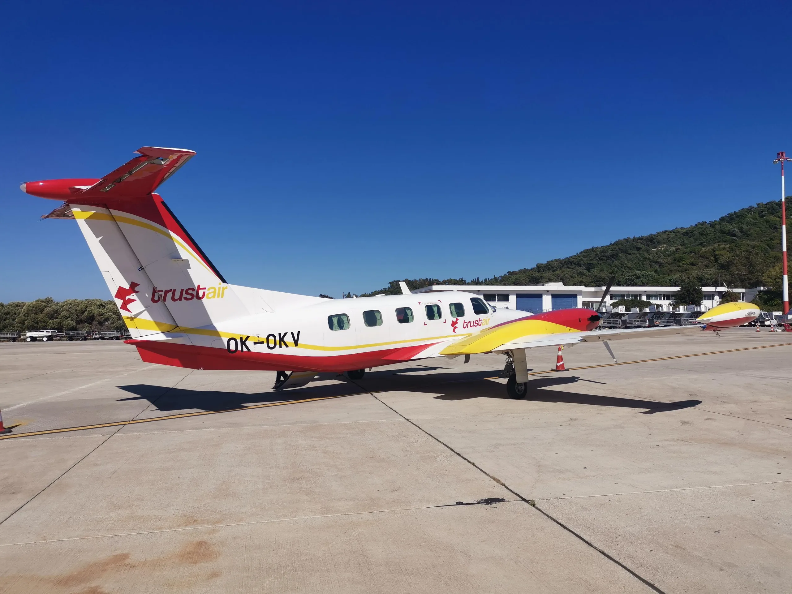 OK-OKV Cheyenne III aircraft with Trust Air livery parked on the tarmac.