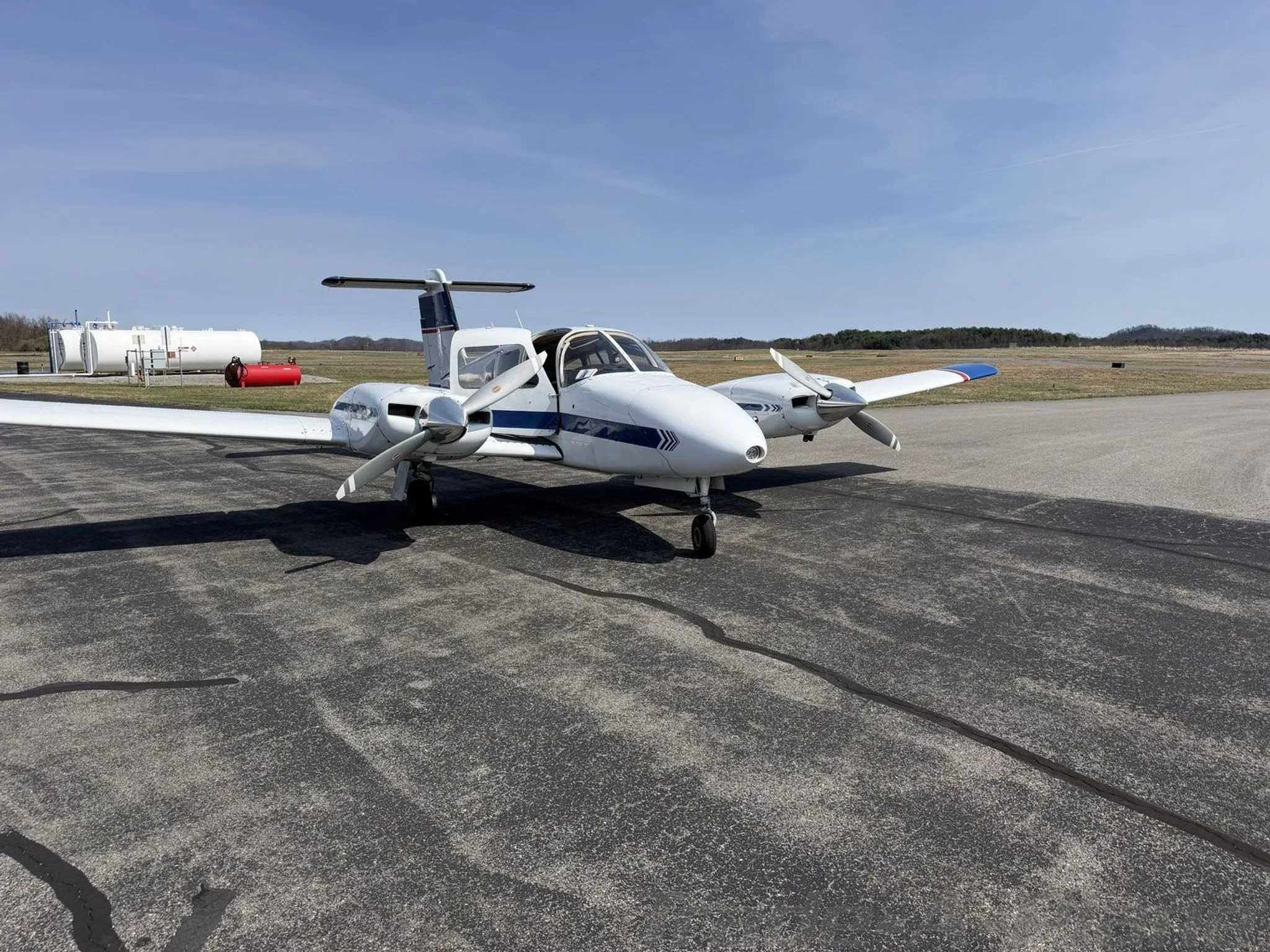 A front view of the 1978 Piper Seminole on the tarmac.