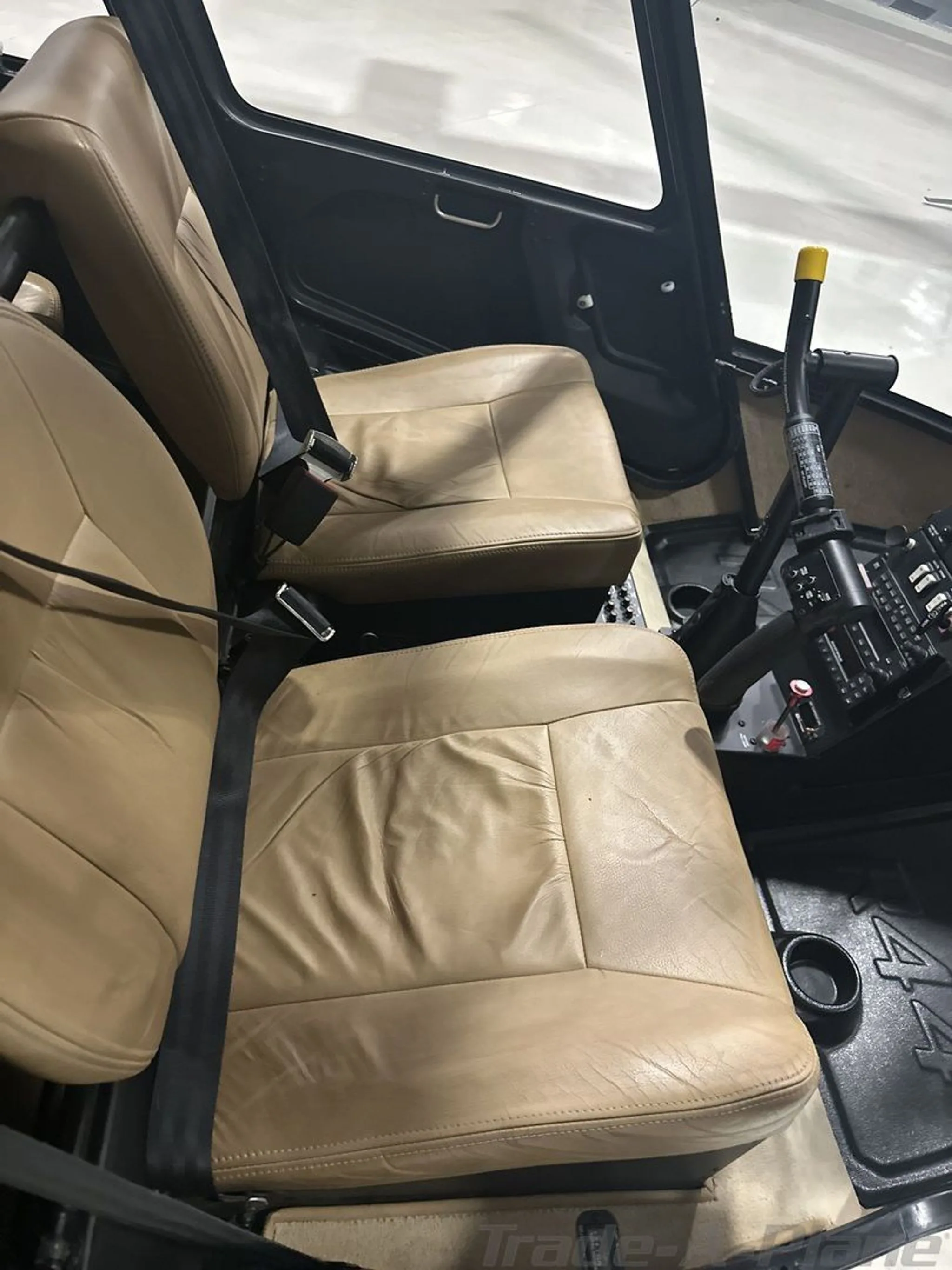 The interior seating area of a Robinson R44 Raven I.