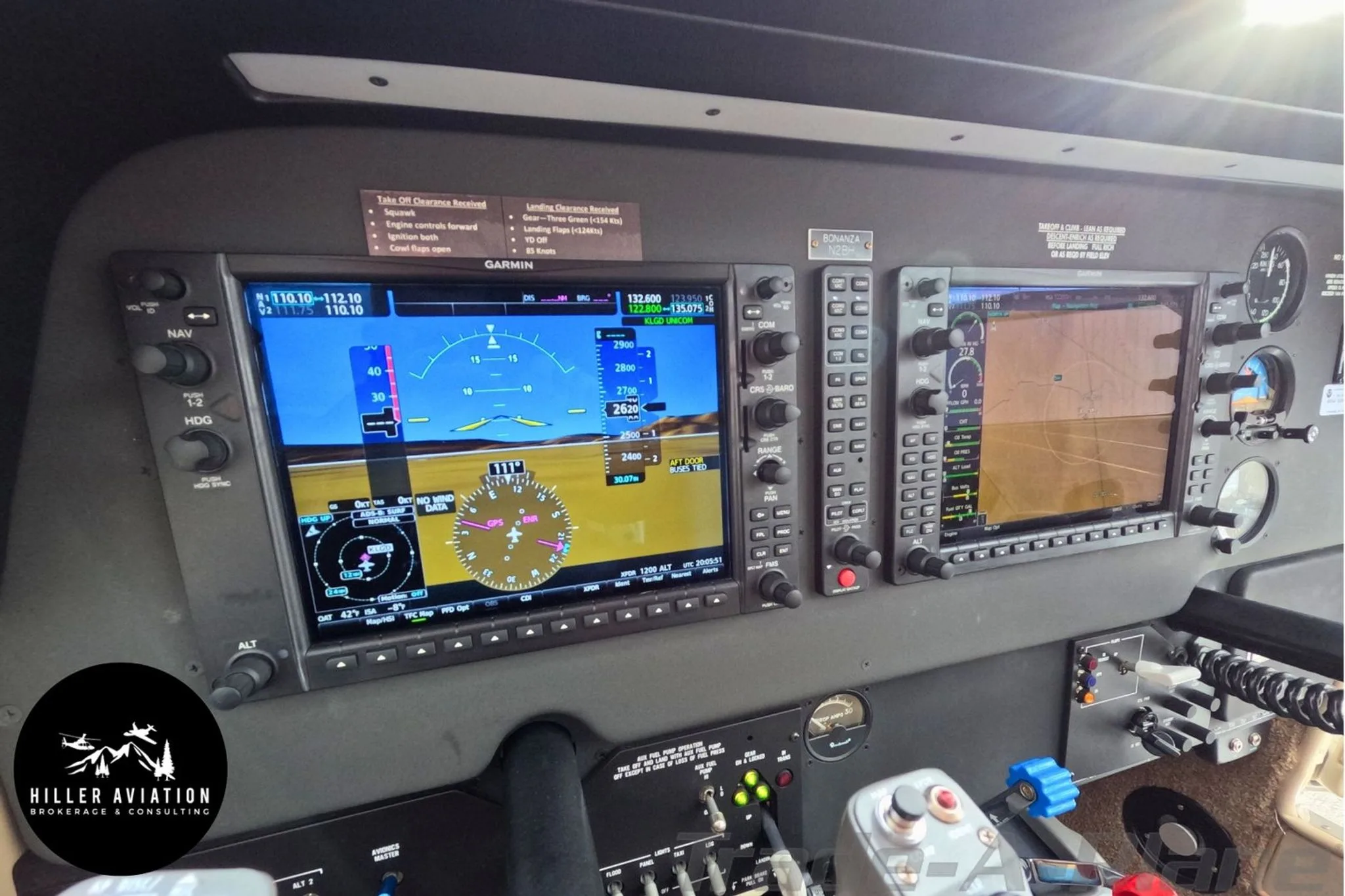 Close-up of the Garmin glass panel avionics in the cockpit of a Beechcraft Bonanza G36.
