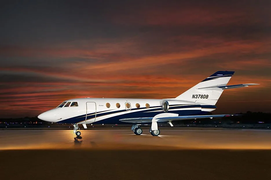 N378DB aircraft parked on the tarmac at sunset.