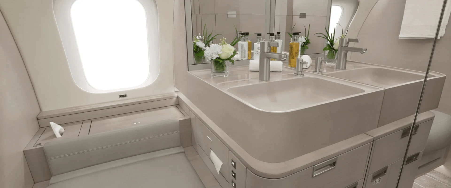 Lavatory with sink and window in the aircraft.
