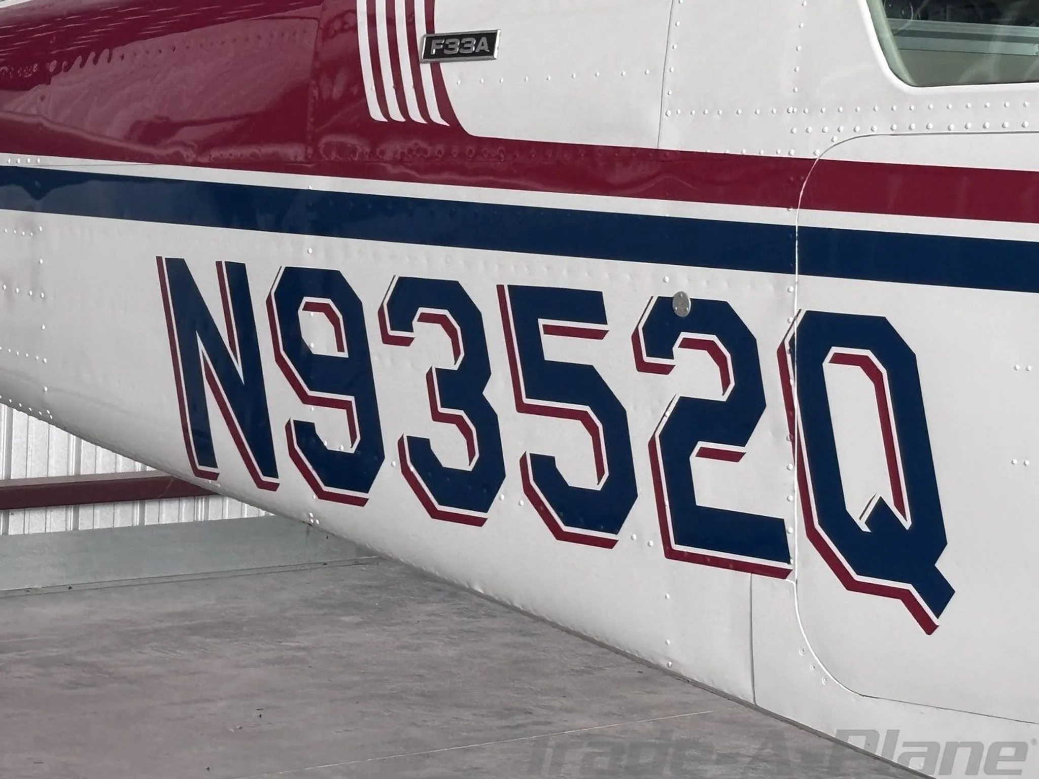 A close-up of the aircraft's registration number on its tail.