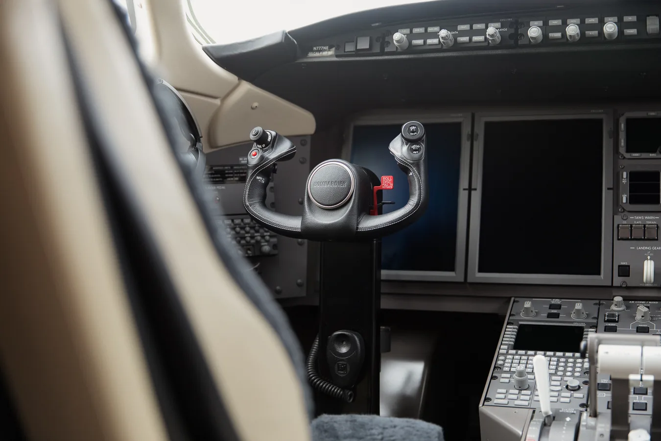 Challenger cockpit view showing yoke and instrument panel.