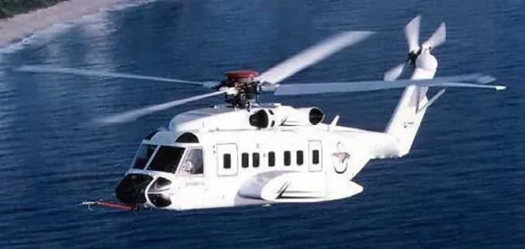 A Sikorsky Helibus VIP flying over water.