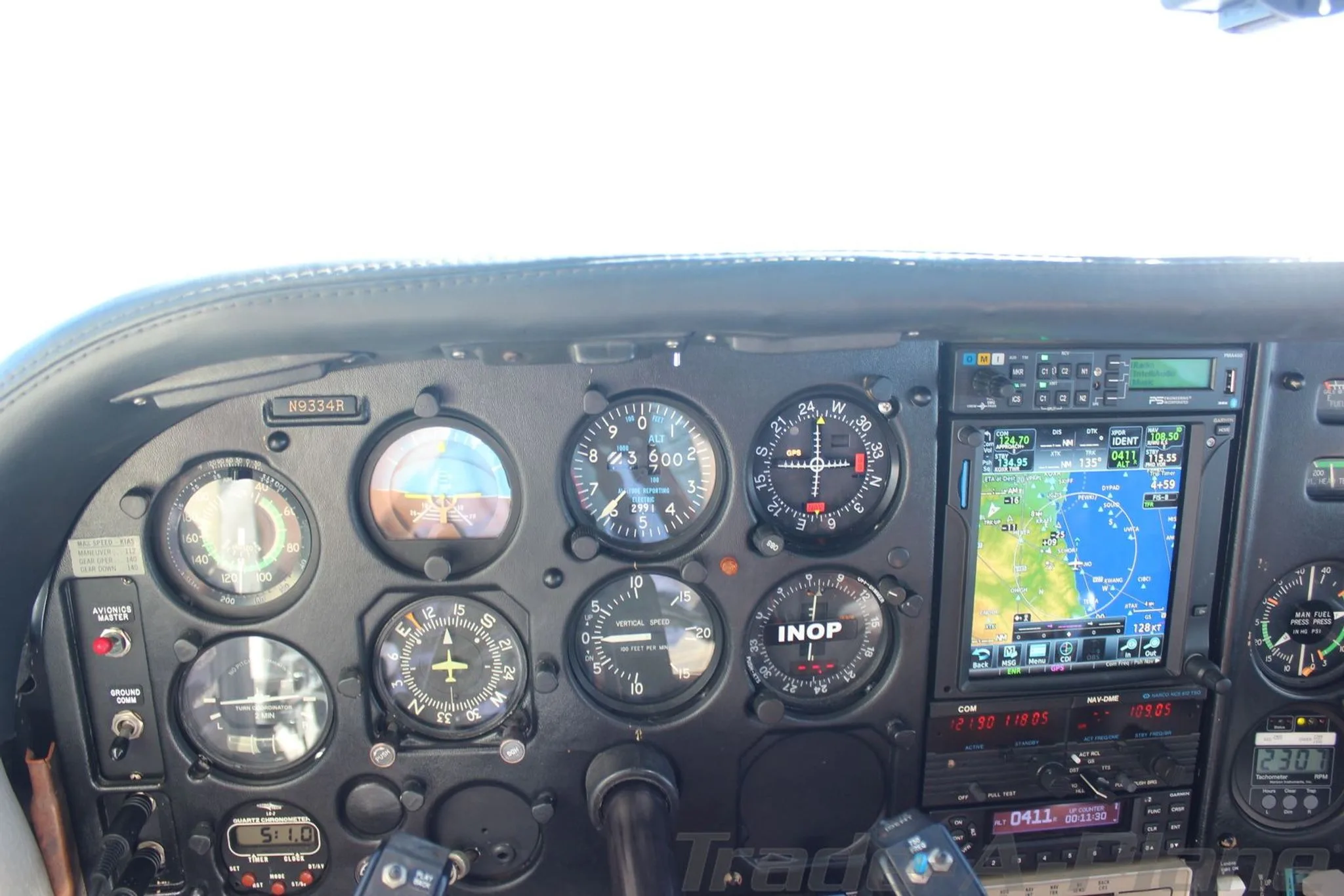 Close-up of cockpit instruments and controls.