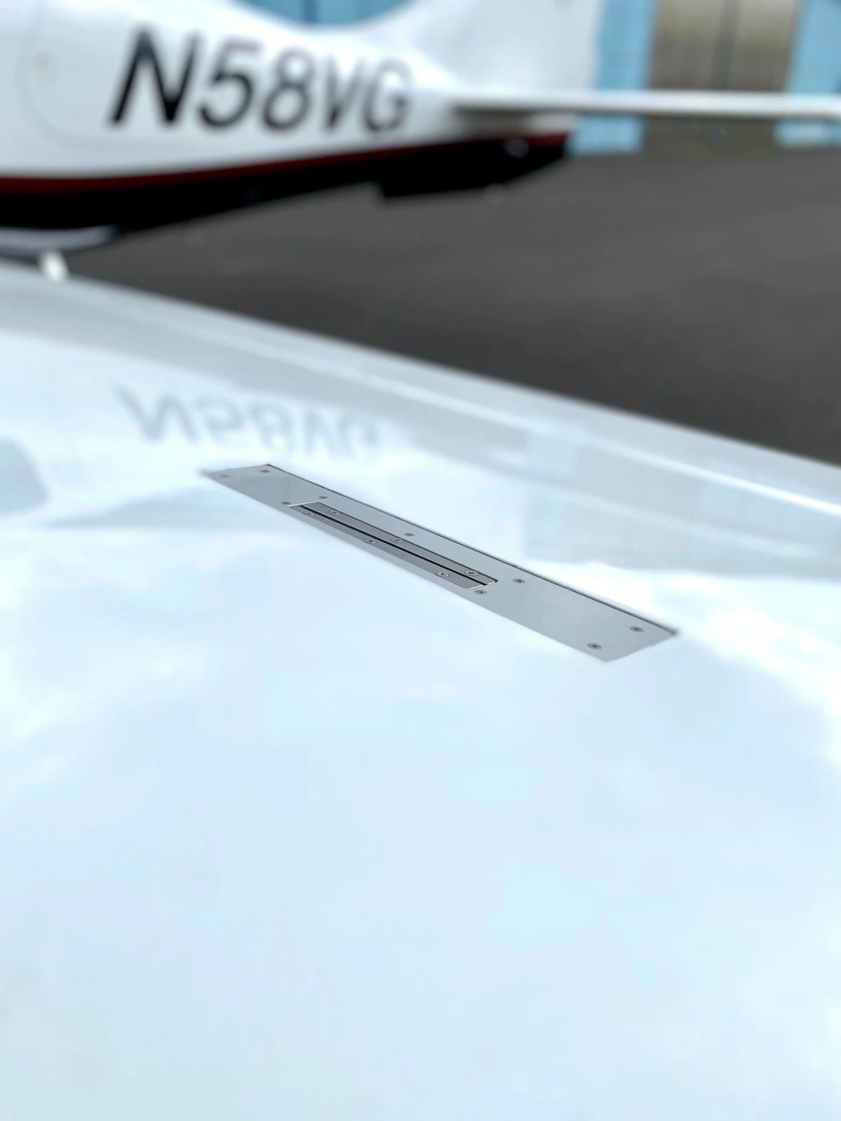 Close up of the wing of Columbia 400 aircraft N58VG.