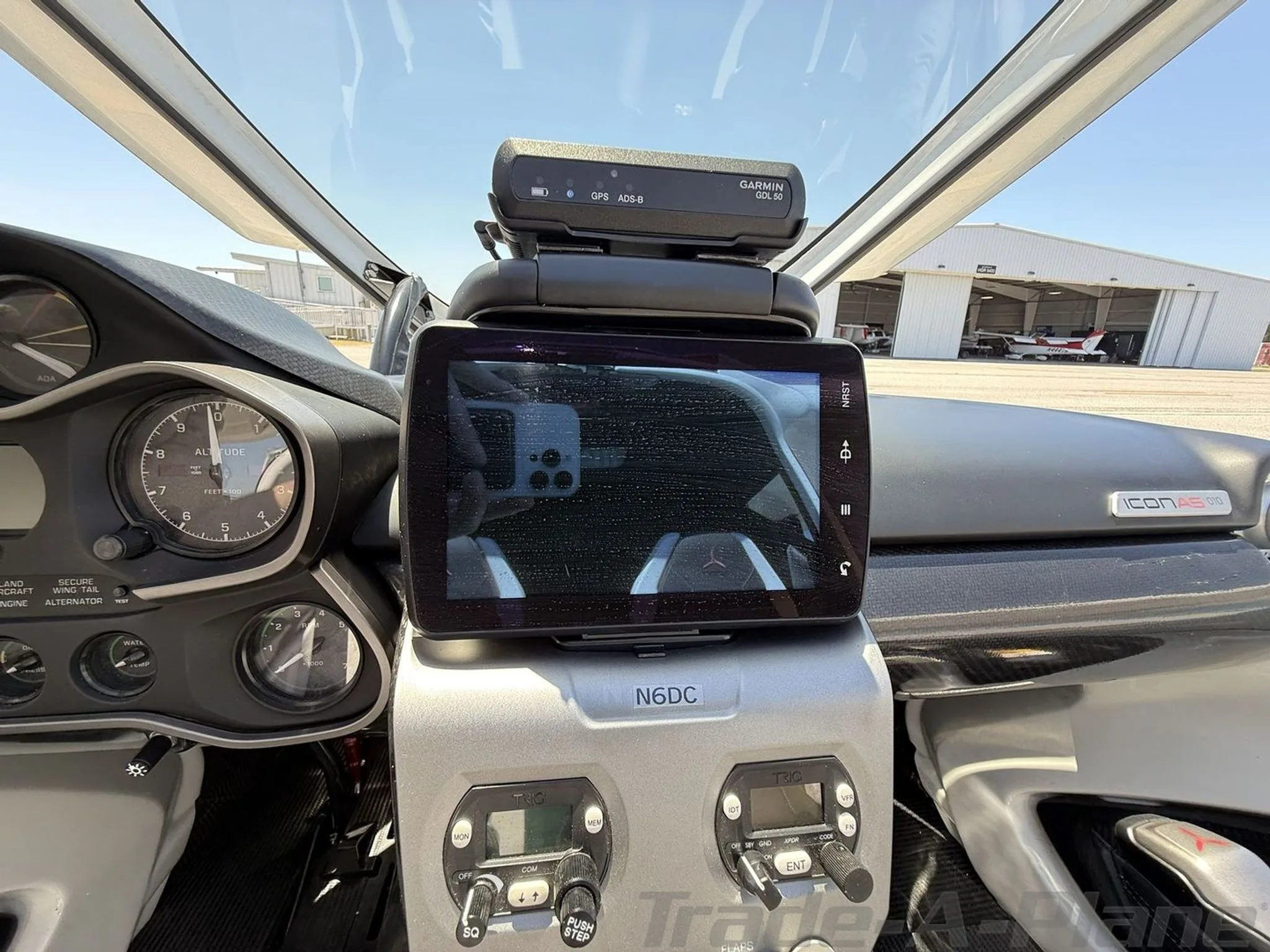 Another view of the cockpit with a display screen.