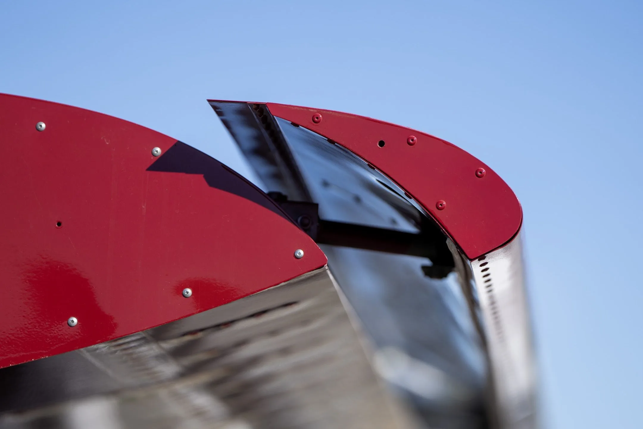 Close-up of the red wingtip of a Just Aircraft SuperSTOL.