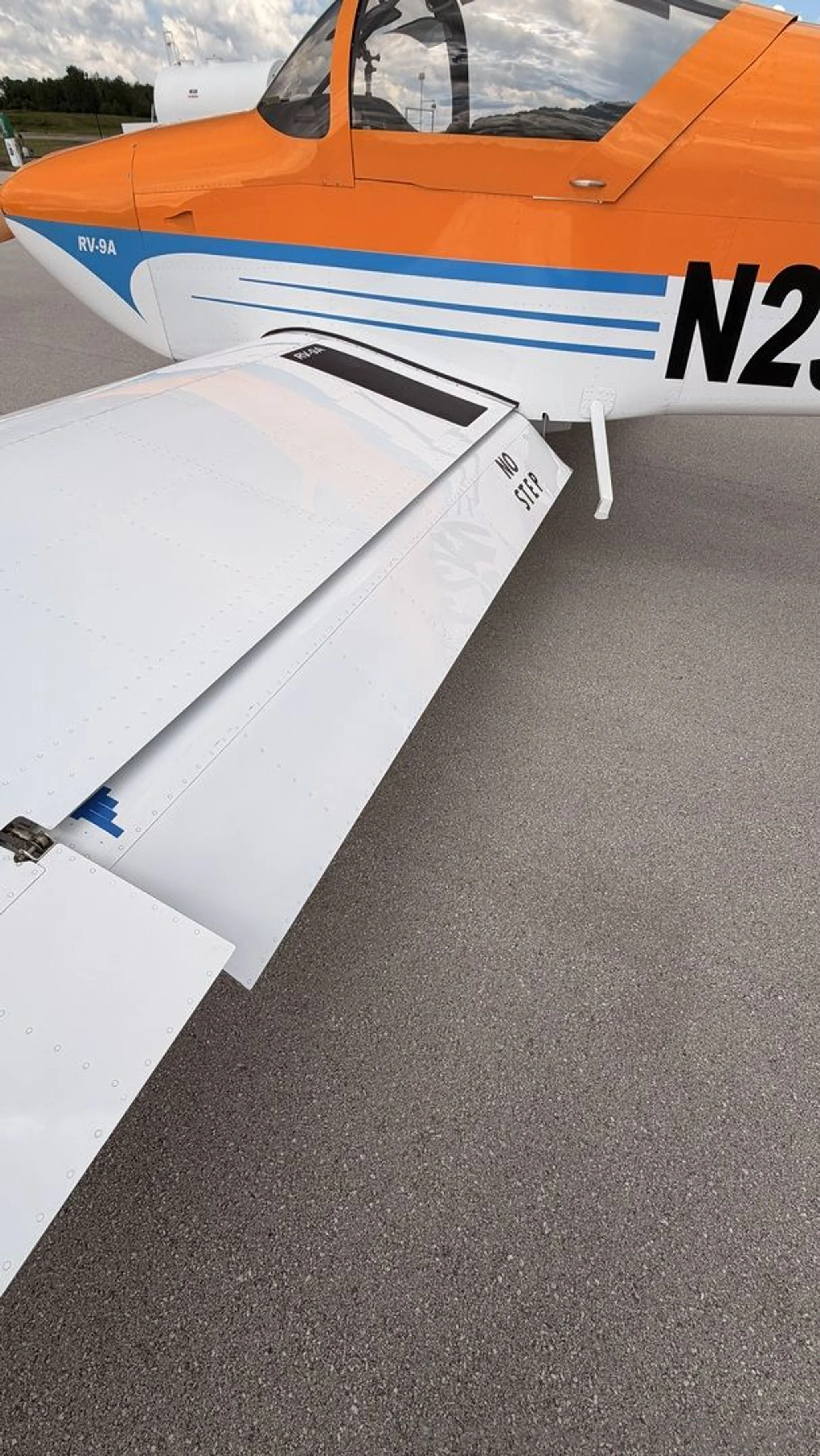 A close-up of the aircraft's wing and flap.