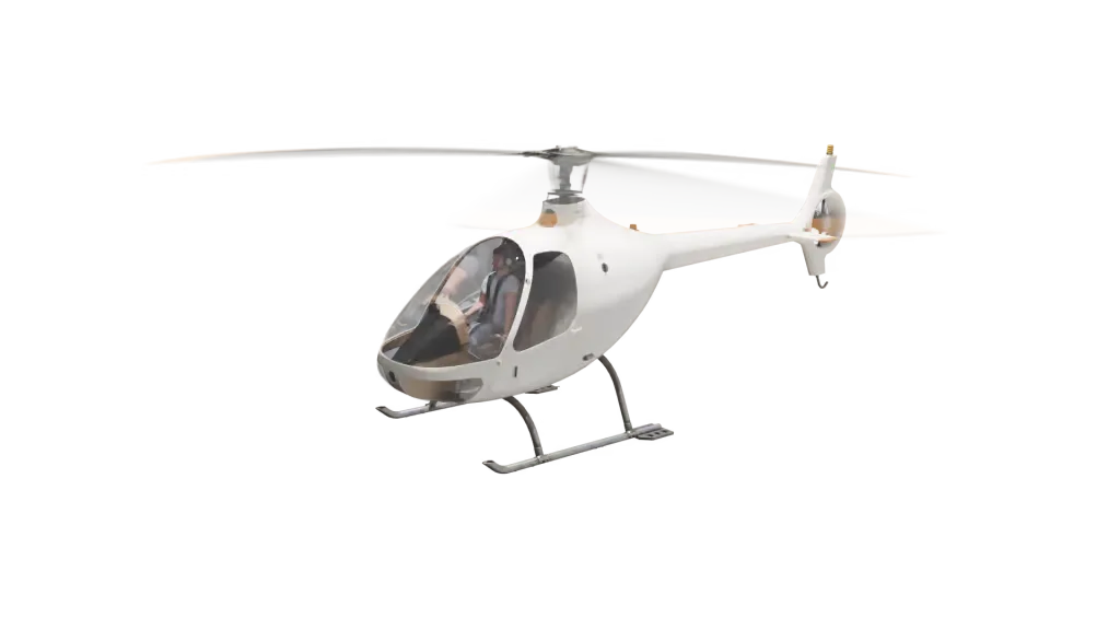 A white helicopter with orange-tipped rotor blades hovers against a plain background.