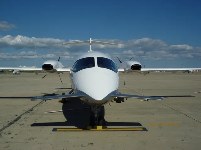 Front view of a Piaggio Avanti EVO aircraft.