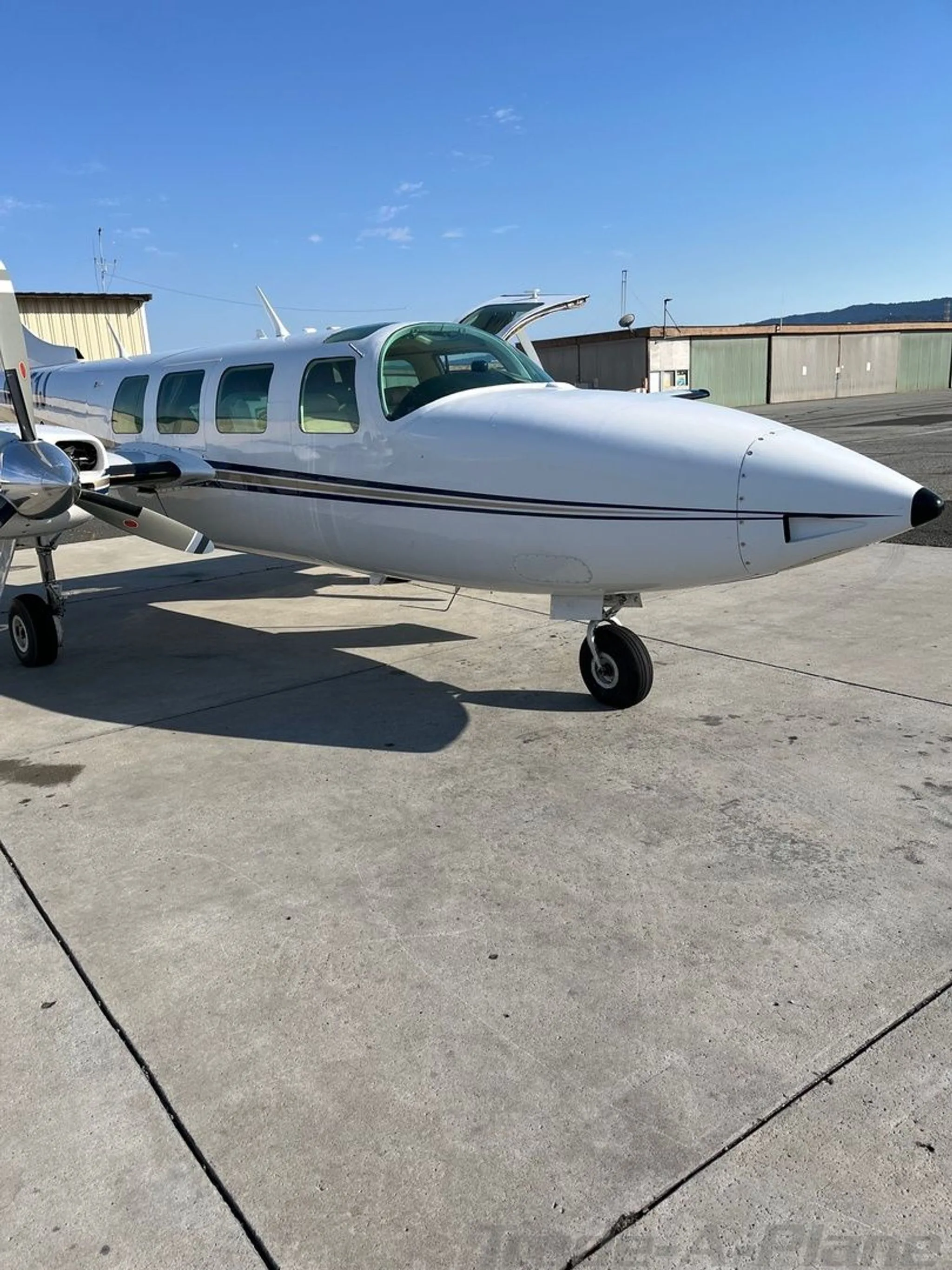 Front view of the Aerostar 600A on the tarmac.
