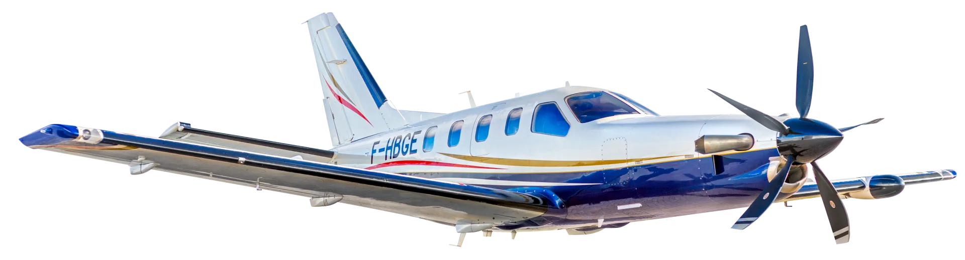 A white and blue Daher TBM turboprop aircraft with registration F-HBGE, viewed from the front-right side.