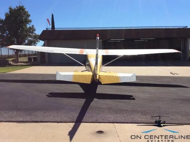 Rear view of N8834X Cessna 172 Skyhawk on the tarmac.