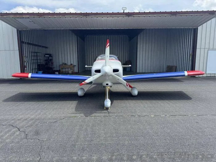 Front view of the RV6A parked in a hangar.