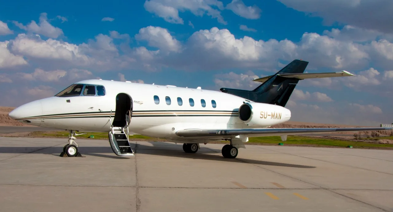 Side view of the SU-MAN aircraft with the door open and stairs extended.