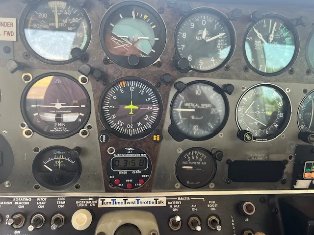 Detailed view of the aircraft's instrument panel, showing flight and engine gauges.
