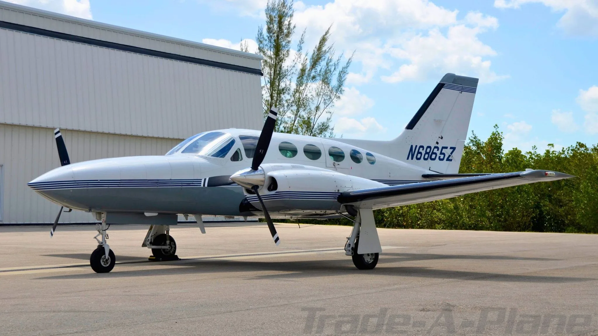 A Cessna 421C parked on the tarmac.
