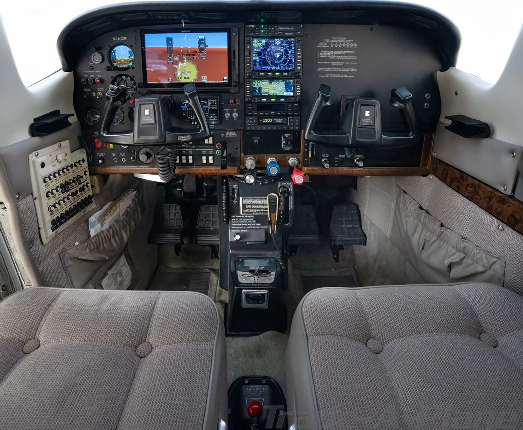 The cockpit view with instruments and controls.
