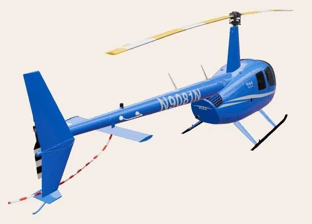 A blue Robinson R44 helicopter with registration N9081N, viewed from the rear-right side.