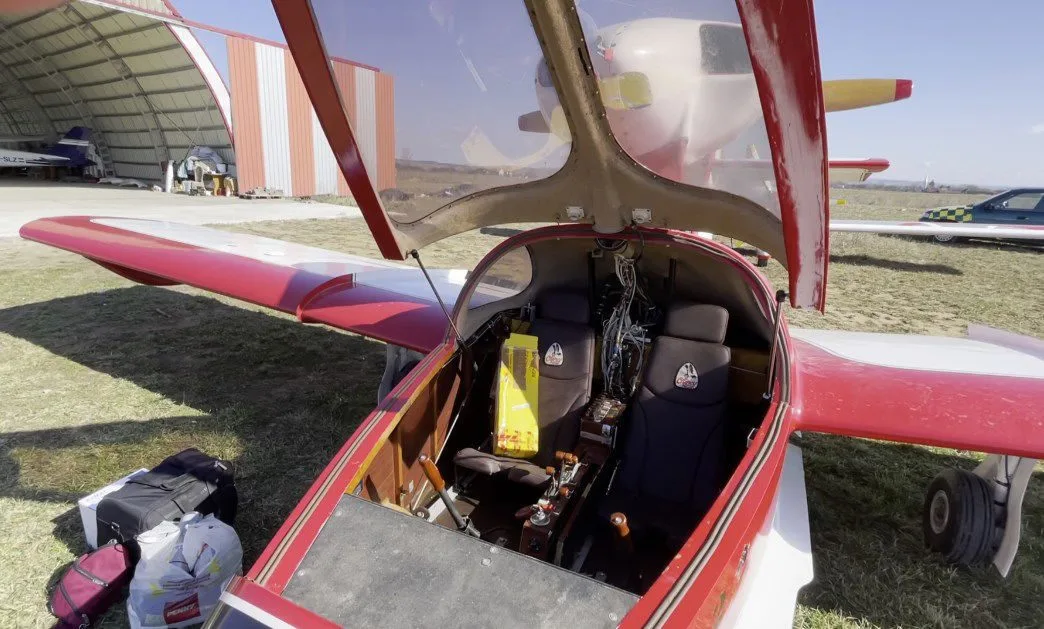 Interior view of the Osprey 2 aircraft cockpit with seats and controls.