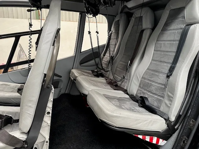 View of the rear passenger seats inside the helicopter.