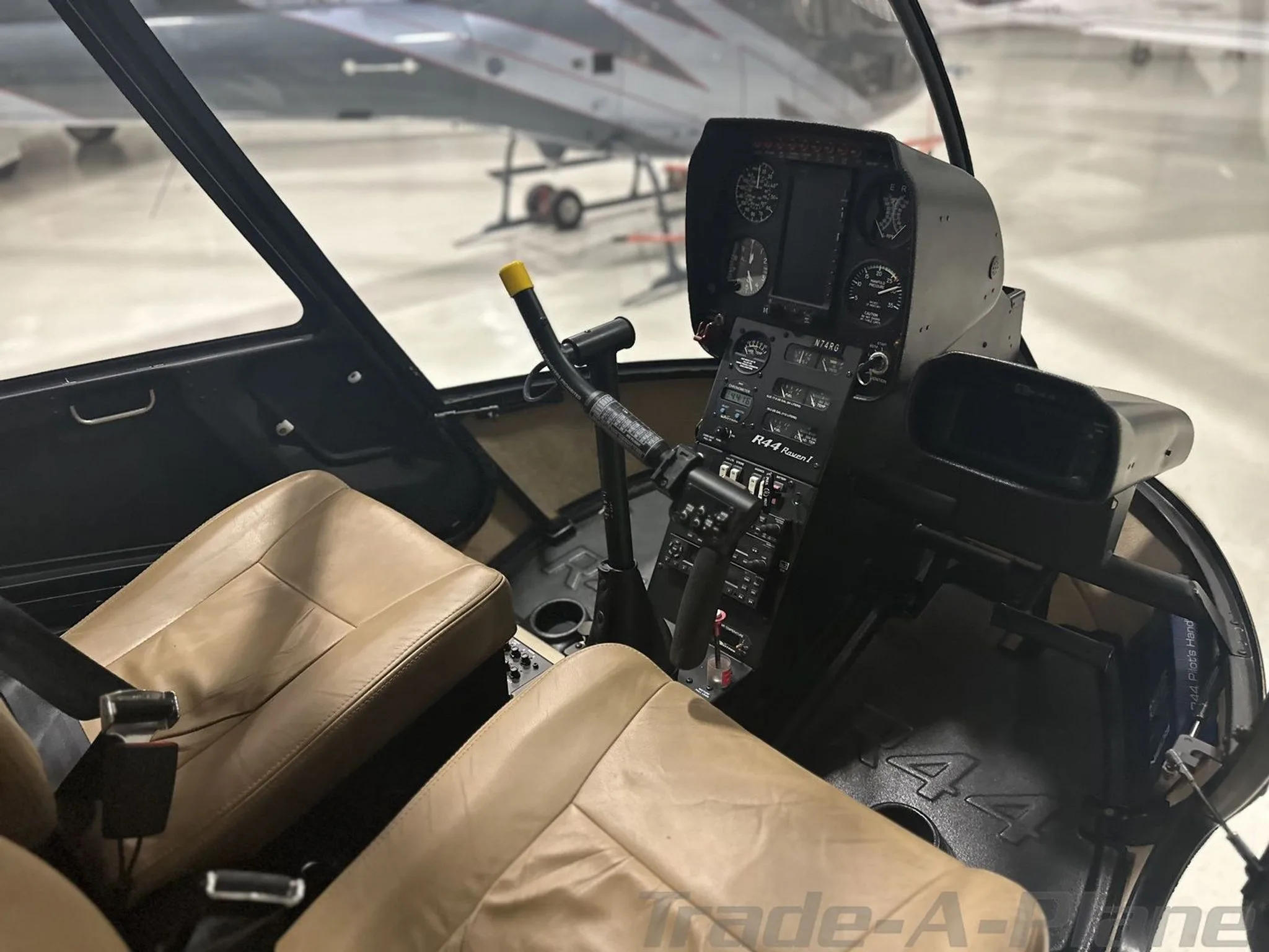 The cockpit instrument panel of a Robinson R44 Raven I.