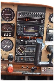 View of the cockpit and front seats of the aircraft.
