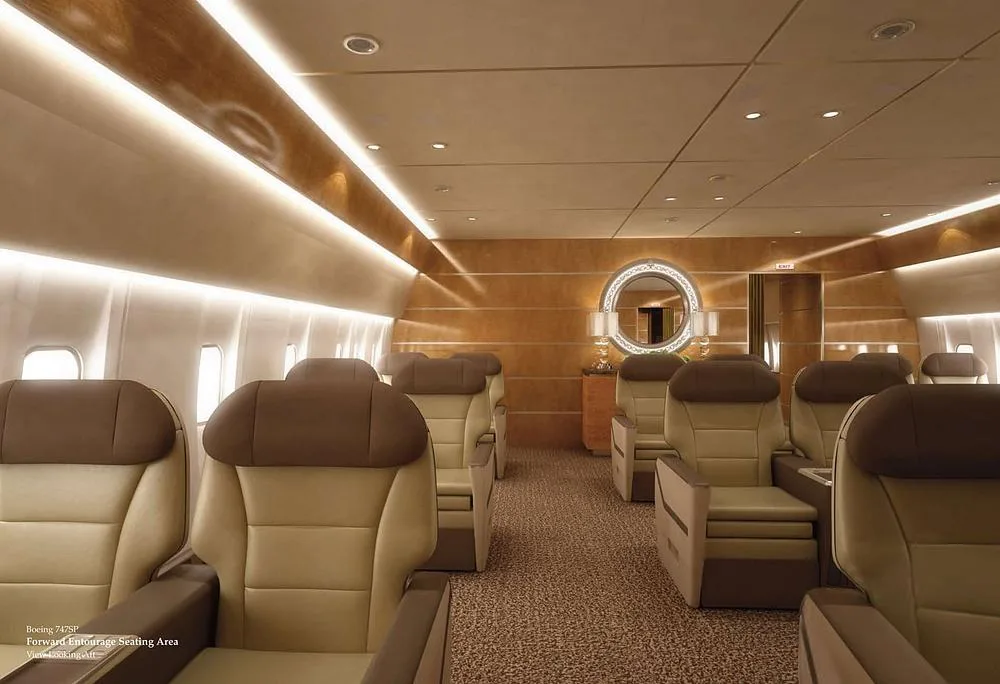 A luxurious aircraft interior rendering with brown and beige seating in the forward empennage area of a Boeing 747SP.