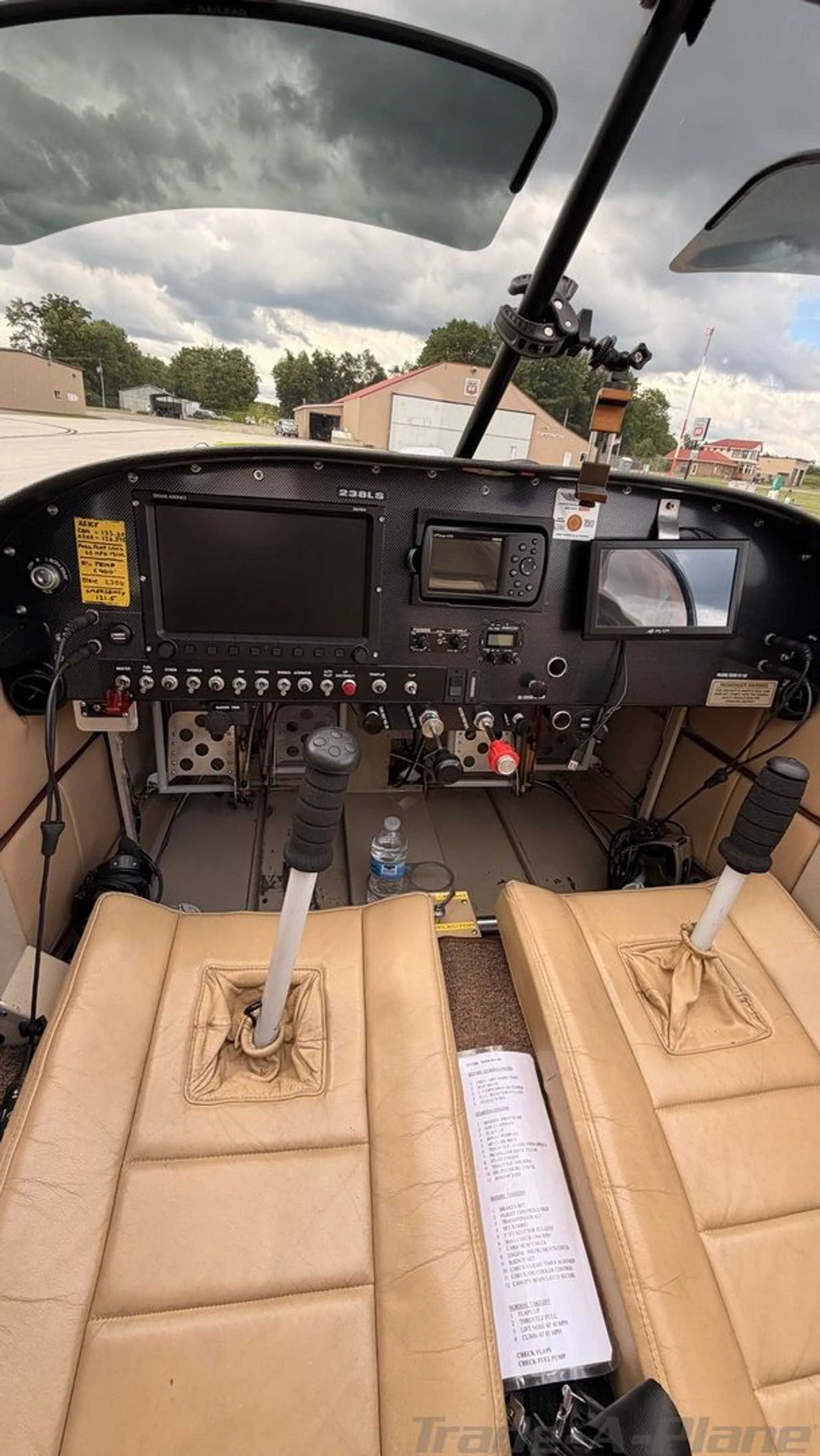 The cockpit interior showing the control sticks and instruments.