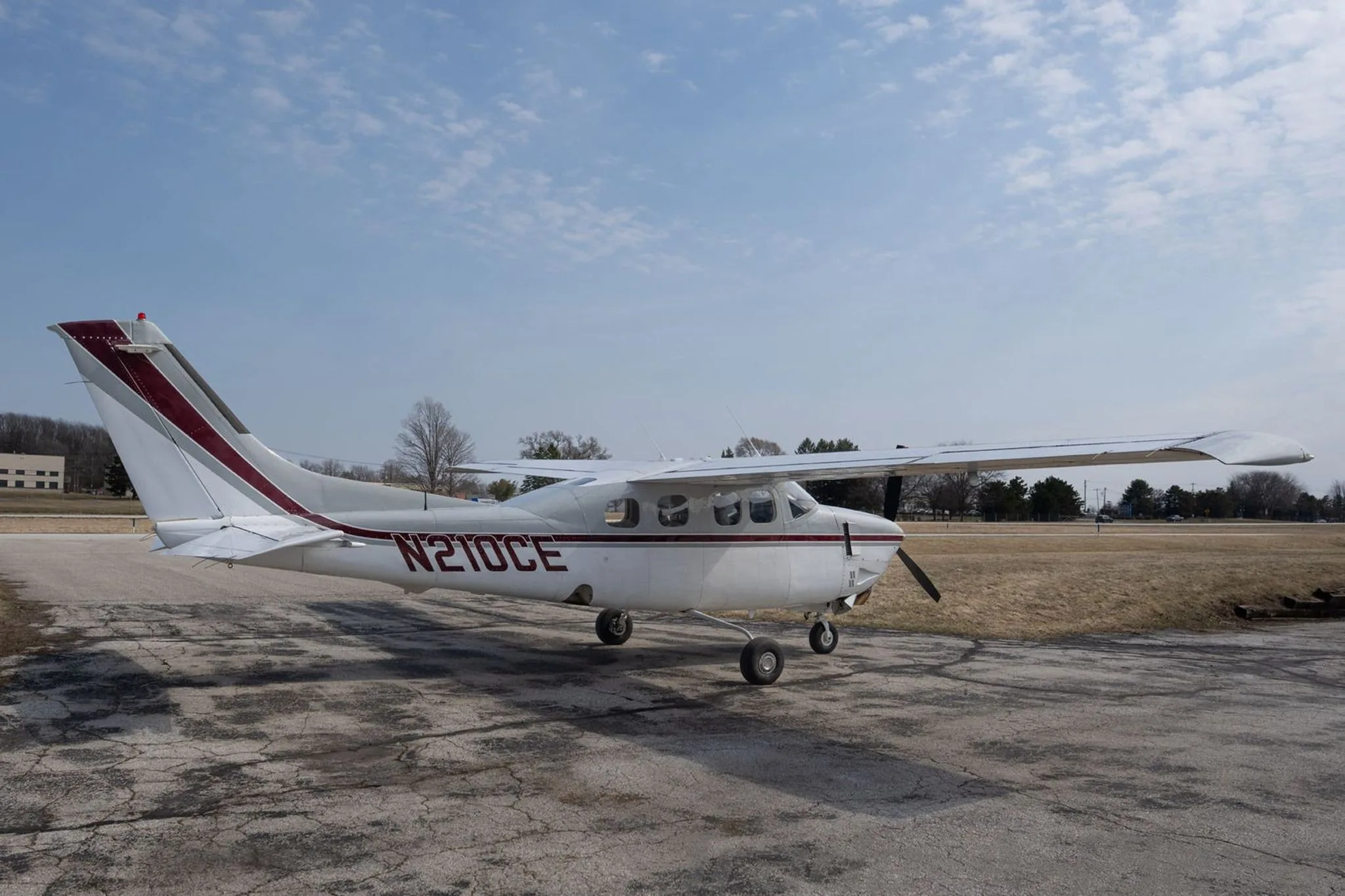 A different angle of the Cessna P210N on the tarmac.