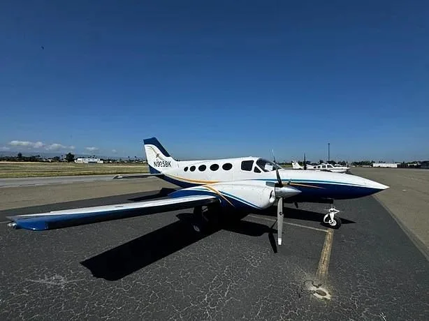 A Cessna 421C parked on the tarmac.