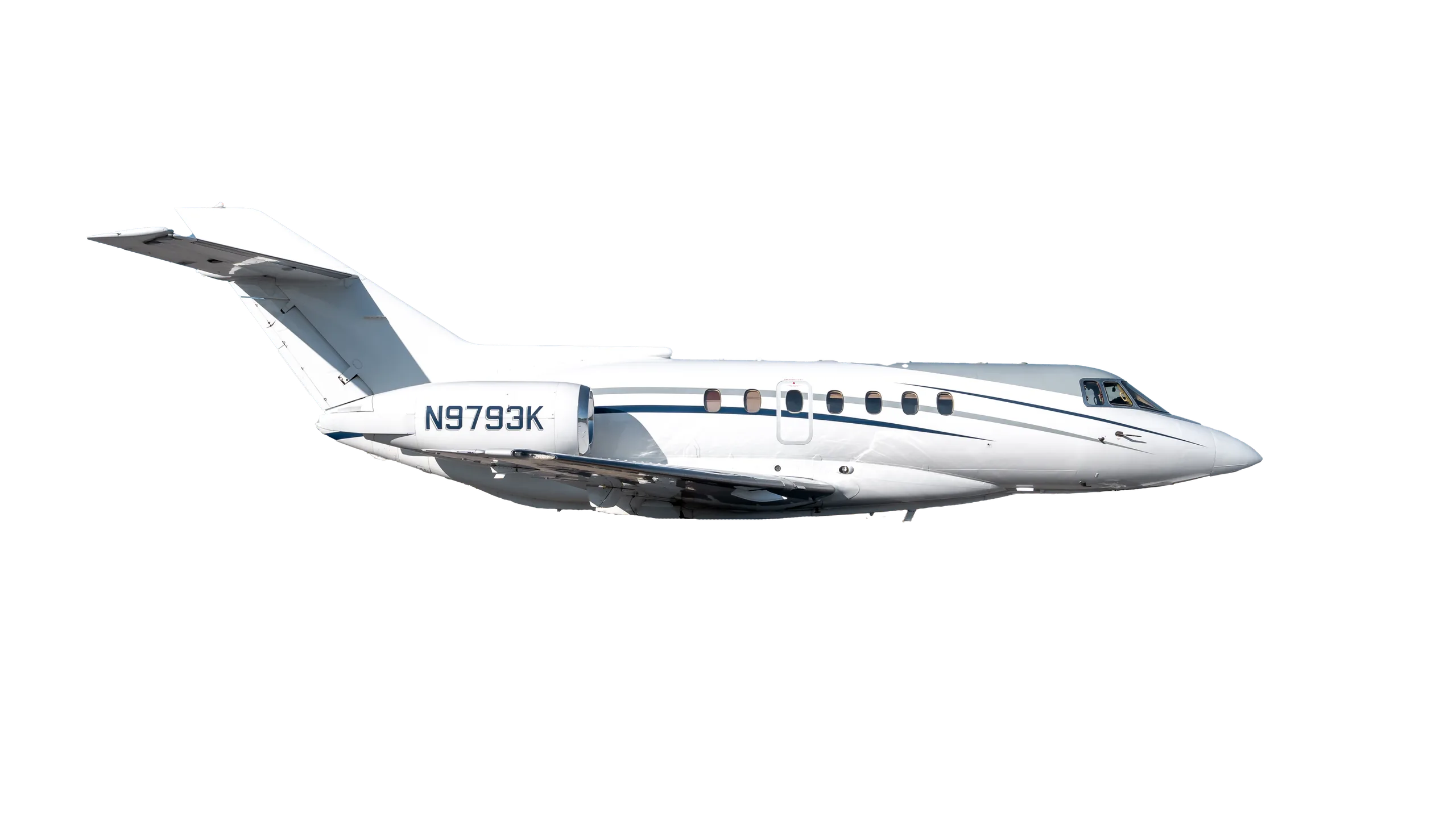Side view of a white and blue jet with registration N9793K against a black background.