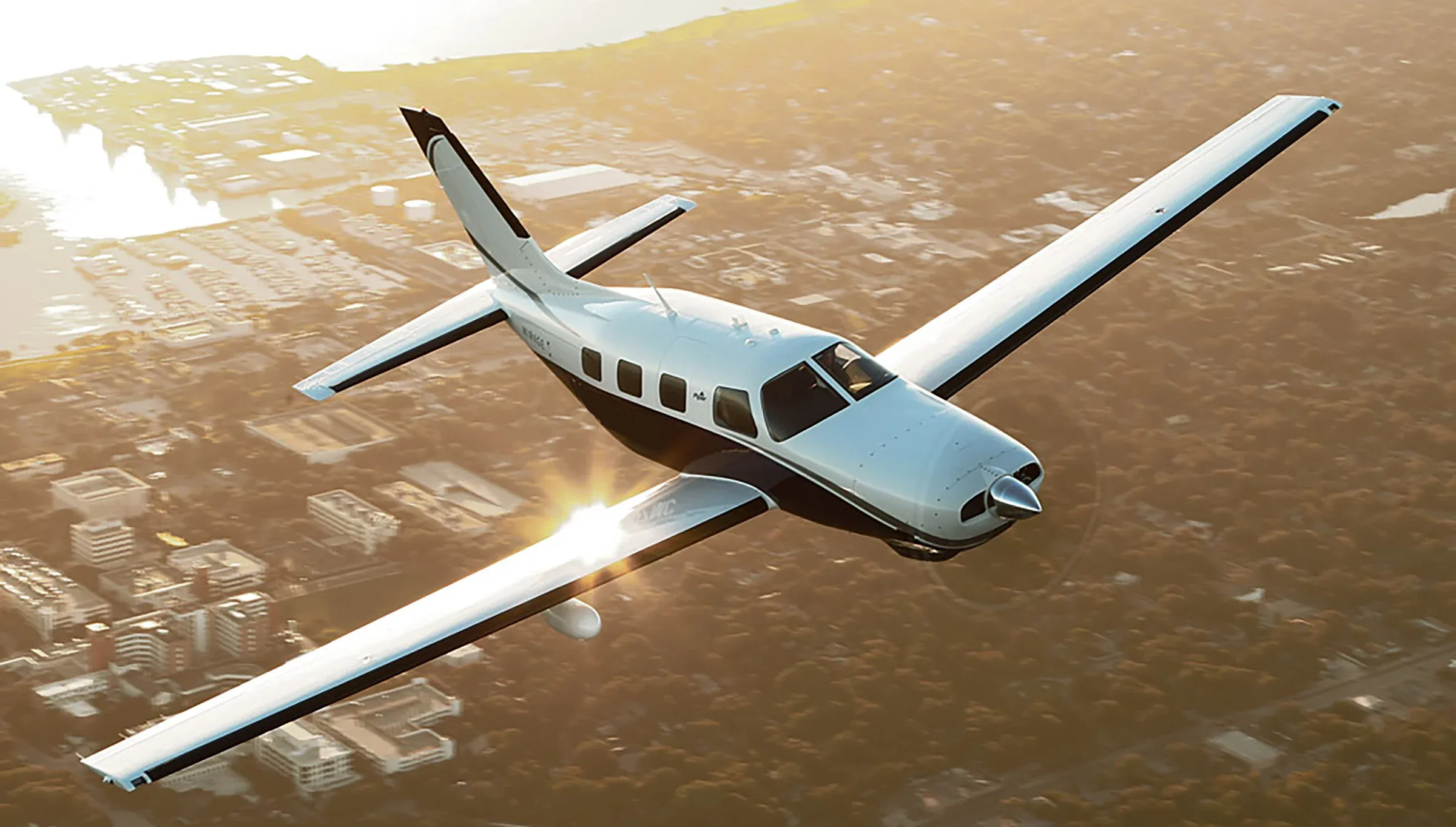 A Piper Mirage aircraft in flight over a city at sunset.