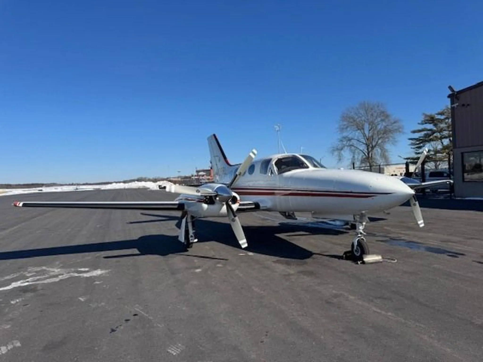 Another angle of the aircraft parked on the ground.