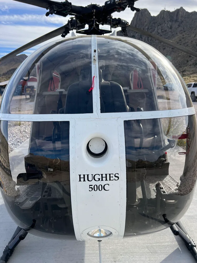 Close-up of the front of the McDonnell Douglas 500C helicopter.