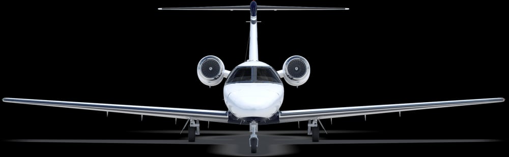 Front view of a Citation CJ4 aircraft on a black background.