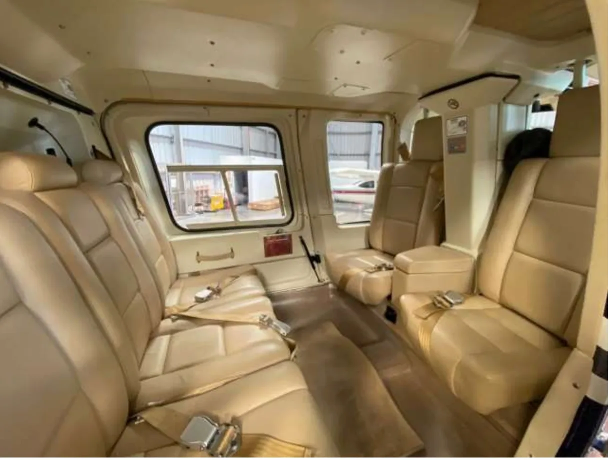 Another interior view of the Bell 206L-4 with seating arrangement.