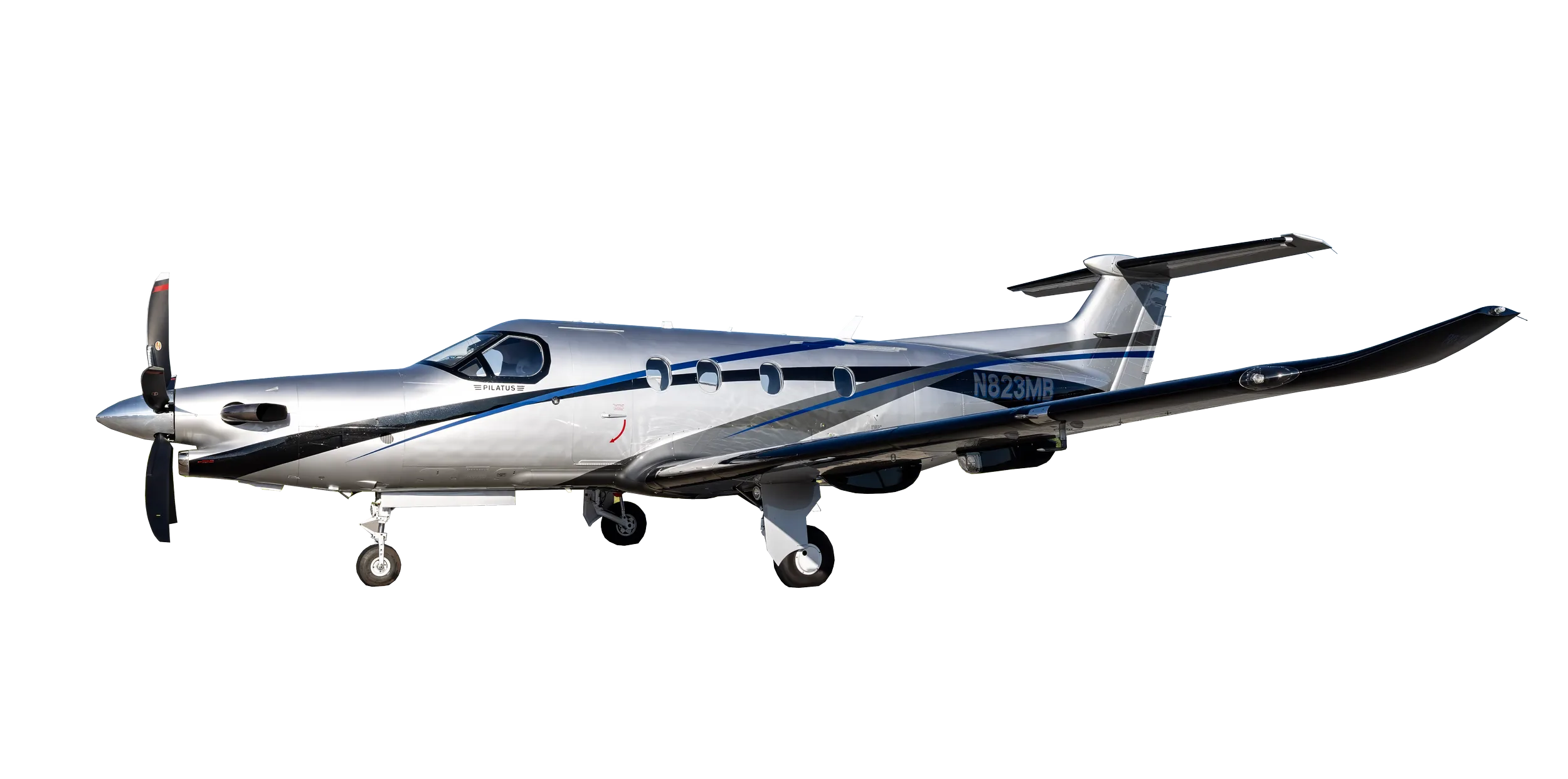 A silver Pilatus PC-12 aircraft with blue and black stripes, seen from the side on the ground.