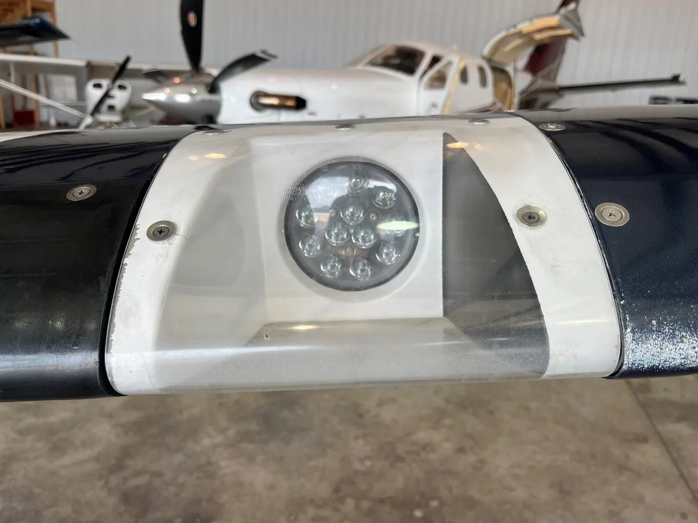 A close-up view of an LED landing light on the wing of an aircraft.