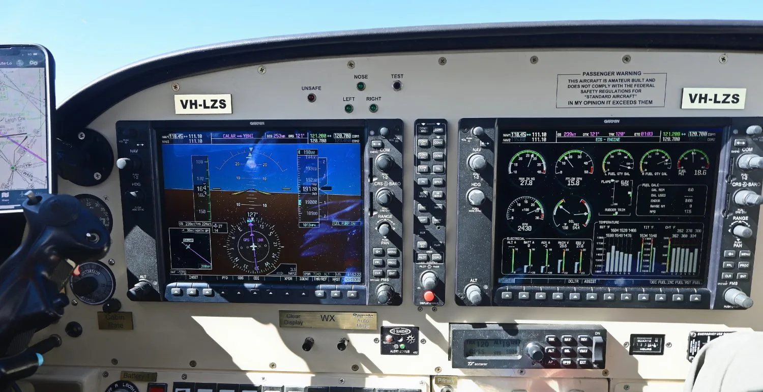 The cockpit instrument panel of a Jabiru J430 aircraft (VH-LZS) showing two large digital displays and various gauges.
