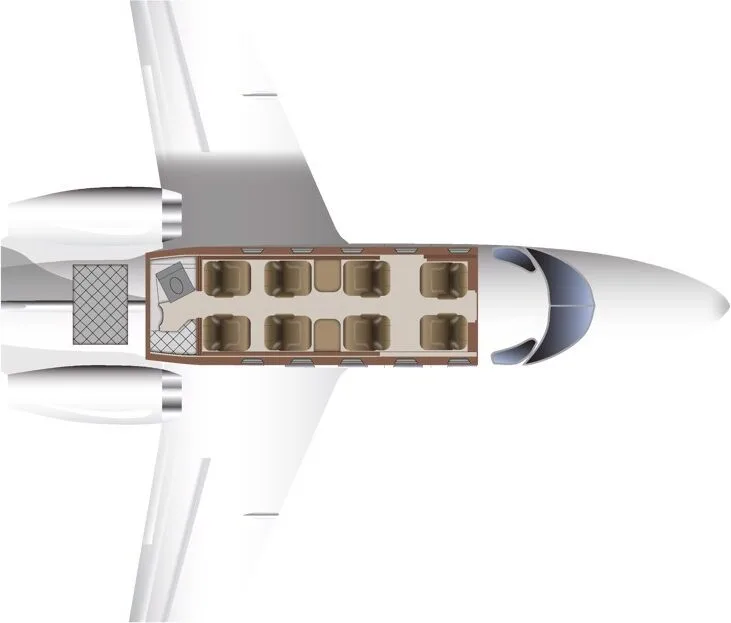 A top-down diagram showing the interior cabin layout of a private jet with seating and a lavatory.