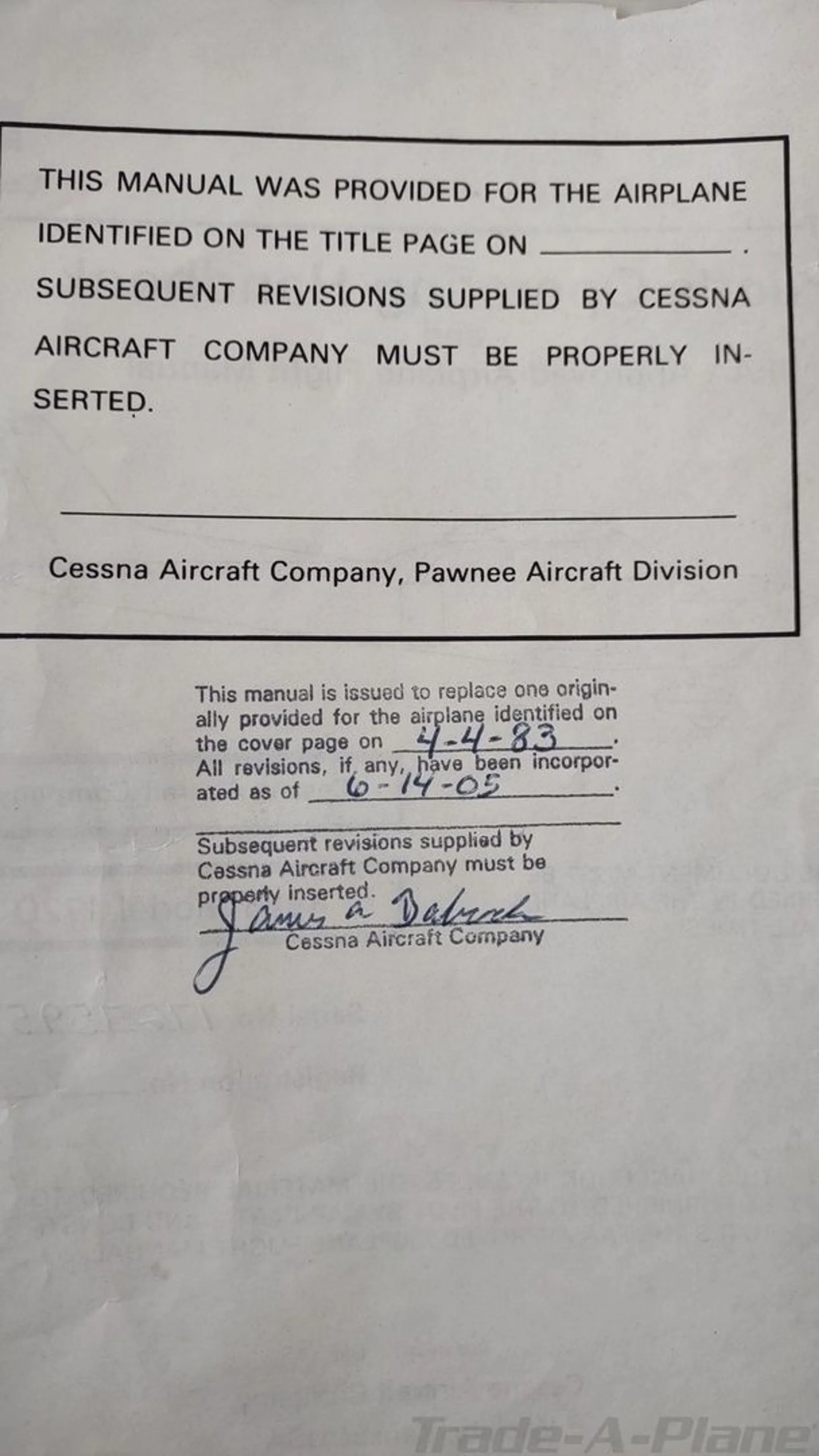 A page from a Cessna Aircraft Company manual with revision dates and signatures.